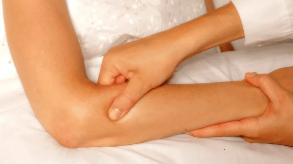 Close-up of an arm massage session focusing on muscle relaxation and tension relief.